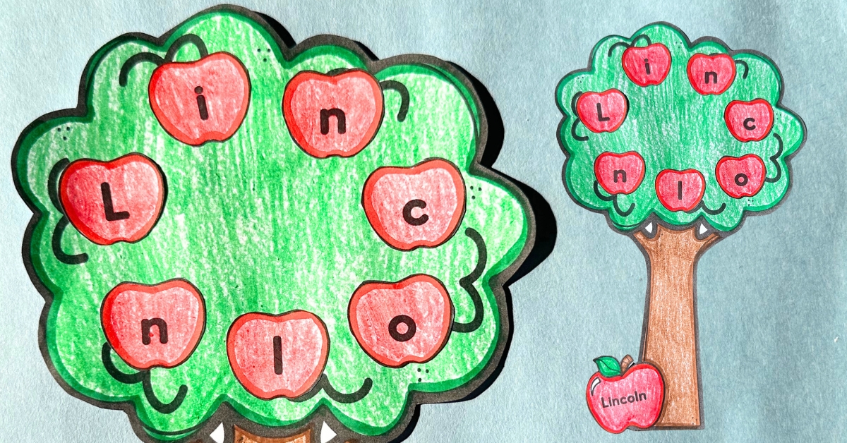 Colored apple tree name craft showing the name Lincoln spelled with red apples placed on a green tree, with a matching apple at the bottom displaying the full name.